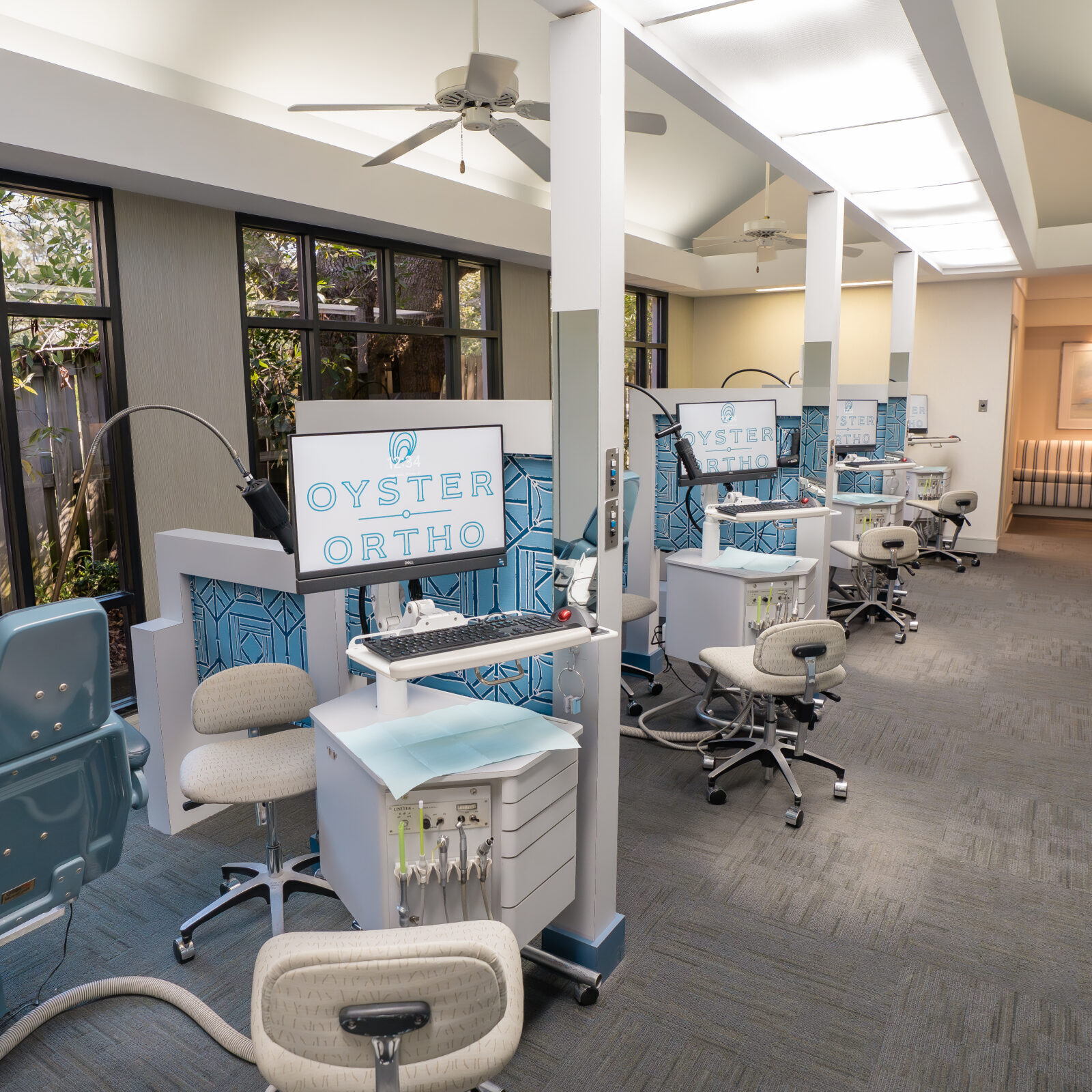 Mobile orthodontics treatment area with modern dental chairs and equipment at Oyster Orthodontics